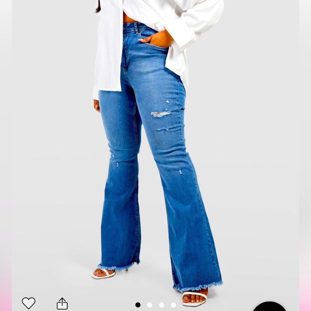 Flared Distressed Denim Jeans